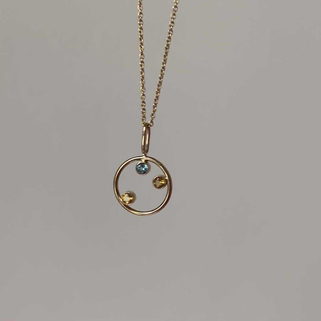 a short video of the family pendant dangling on our  jamie 14k gold chain.